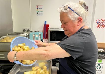 Hazel preparing potatoes